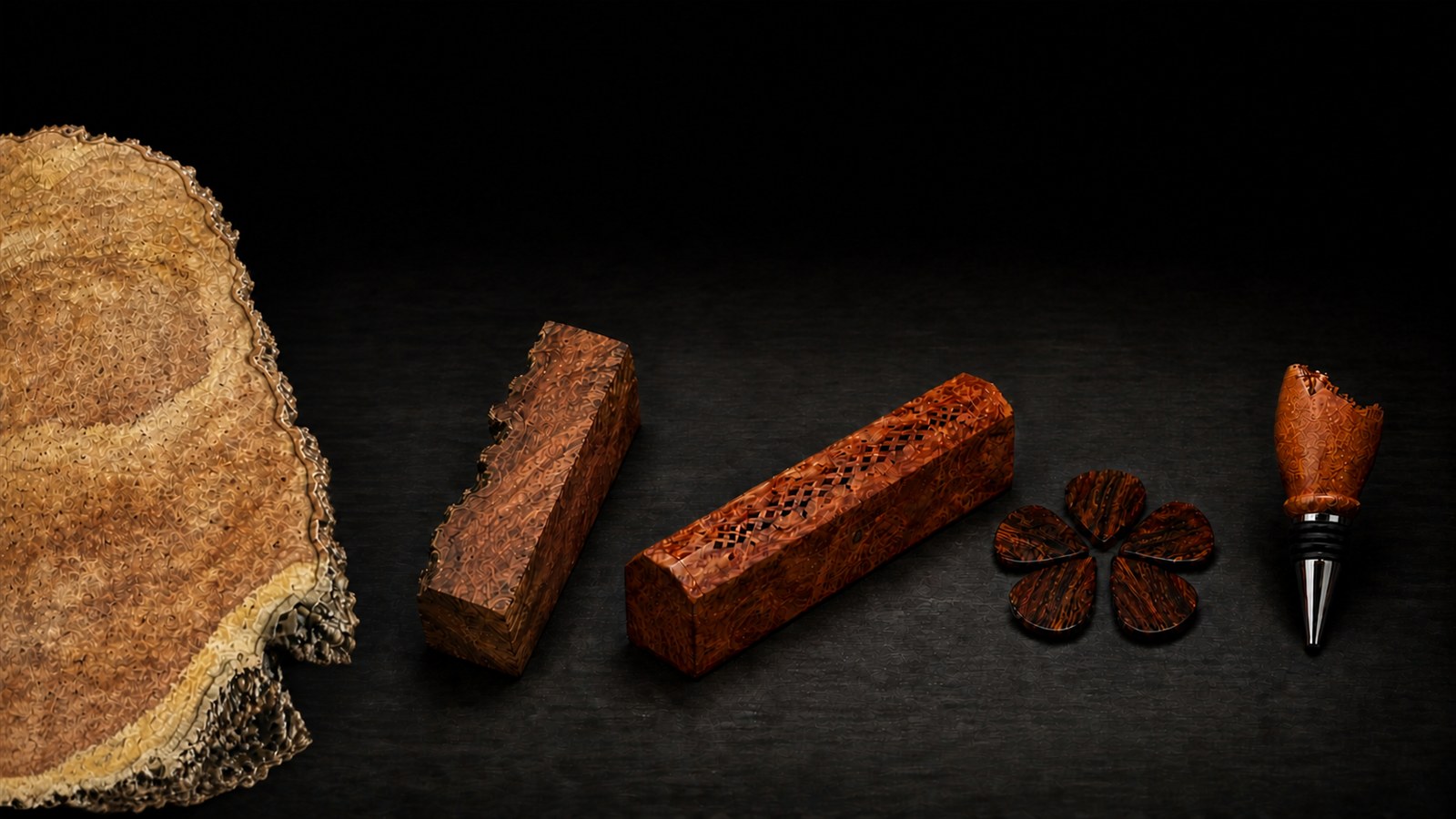 A natural Vietnamese burl cross-section, rough offcut, incense box, five Cocobolo picks and a burl wine stopper